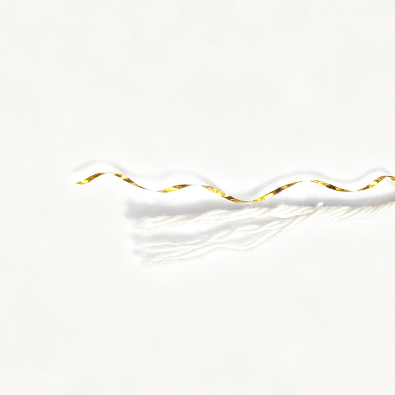 Multi-ply cotton rope twisted with metallic thread